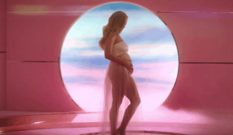 Katy Perry reveals pregnancy in music video