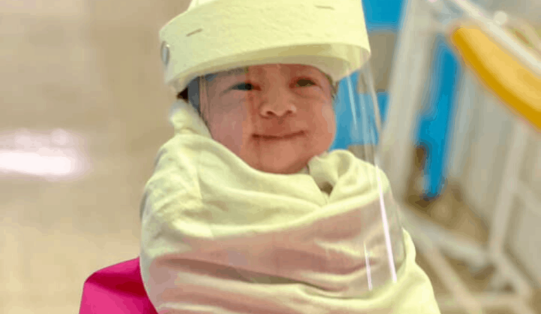 On the bright side: Parents hope viral photo of their beaming newborn is a reminder to keep smiling despite COVID-19 crisis